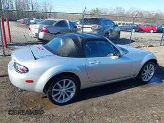 2007 Mazda MX-5 Miata Sport z VIN JM1NC25F170135777, wystawiony jako IAAI lot #41746586 z przebiegiem 107 302 mil mil oraz . Historia ofert i sprzedaży dostępna na DreamBid. Obrazek 13.