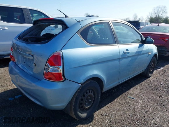 2007 Hyundai Accent SE with VIN KMHCN36CX7U031496, listed as a IAAI auction lot 41811183 with 201,740 mi miles. Bid and sale history available at carsss.com. Image 4.