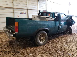 1997 Nissan Frontier XE with VIN 1N6SD16Y2VC338776, listed as a Copart auction lot 45020595 with 243,030 mi miles and Salvage title. Bid and sale history available at DreamBid. Image 3.