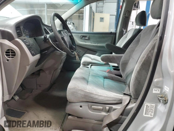 2002 Honda Odyssey EX with VIN 2HKRL18642H578718, listed as a Copart auction lot 59052525 with 170,928 mi miles and Salvage title. Bid and sale history available at DreamBid. Image 7.