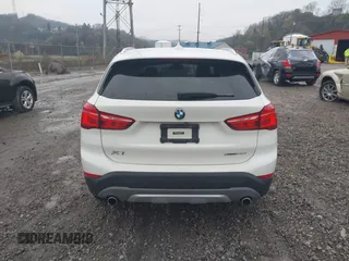 2018 BMW X1 xDrive28i with VIN WBXHT3C33J5L34824, listed as a IAAI auction lot 41977462 with 84,131 mi miles and . Bid and sale history available at DreamBid. Image 16.