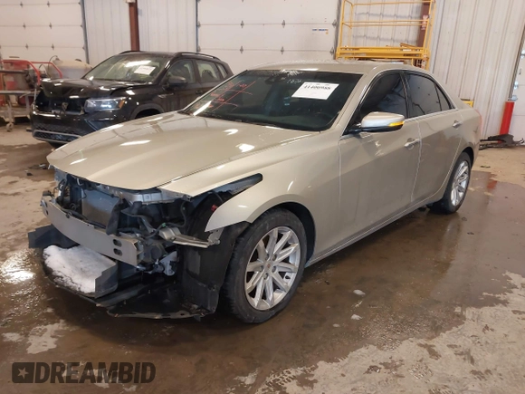 2014 Cadillac CTS Luxury AWD with VIN 1G6AX5S3XE0197628, listed as a IAAI auction lot 41400988 with 144,026 mi miles and . Bid and sale history available at DreamBid. Image 17.