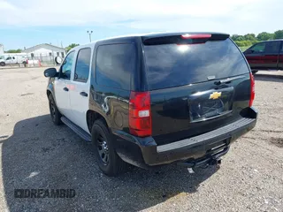 2012 Chevrolet Tahoe Commercial with VIN 1GNLC2E05CR320494, listed as a IAAI auction lot 42838775 with 120,139 mi miles and . Bid and sale history available at DreamBid. Image 3.
