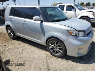 2013 Scion xB with VIN JTLZE4FE5DJ039321, listed as a Copart auction lot 52744485 with 128,536 mi miles and Salvage Title. Bid and sale history available at carsss.com. Image 4.