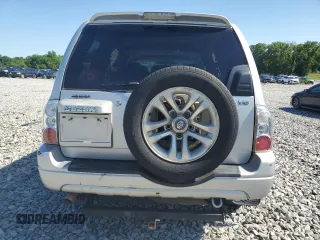 2004 Suzuki XL7 LX z VIN JS3TY92V144105911, wystawiony jako Copart lot #56744425 z przebiegiem 253 975 mil mil oraz Szkoda całkowita • Salvage title. Historia ofert i sprzedaży dostępna na DreamBid. Obrazek 6.