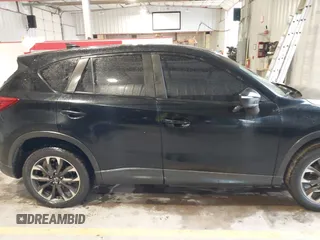 2016 Mazda CX-5 Grand Touring with VIN JM3KE2DY9G0705127, listed as a IAAI auction lot 41412910 with 181,993 mi miles. Bid and sale history available at carsss.com. Image 13.