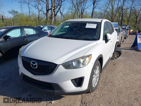 2014 Mazda CX-5 Sport with VIN JM3KE2BE8E0301175, listed as a IAAI auction lot 42051972 with 121,821 mi miles and . Bid and sale history available at carsss.com. Image 17.