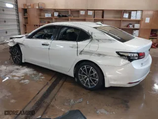 2015 Acura TLX V6 Tech with VIN 19UUB2F59FA026384, listed as a IAAI auction lot 41571218 with 1 mi miles. Bid and sale history available at carsss.com. Image 3.
