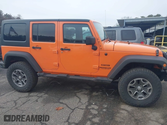 2013 Jeep Wrangler Unlimited Sport z VIN 1C4BJWDG7DL522421, wystawiony jako IAAI lot #41492425 z przebiegiem 55 921 mil mil oraz . Historia ofert i sprzedaży dostępna na DreamBid. Obrazek 13.