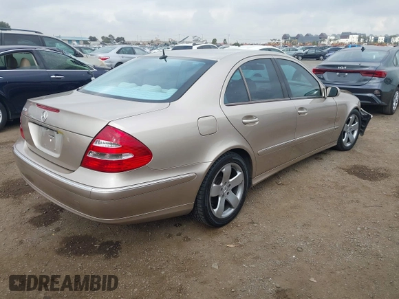 2005 Mercedes-Benz E-Class 3.2L with VIN WDBUF65J25A614469, listed as a IAAI auction lot 41521864 with 90,403 mi miles. Bid and sale history available at carsss.com. Image 4.