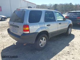 2003 Ford Escape XLT Popular with VIN 1FMYU03103KC87839, listed as a IAAI auction lot 41831997 with 241,204 mi miles. Bid and sale history available at carsss.com. Image 4.