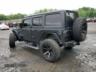 2018 Jeep Wrangler Unlimited Sport S z VIN 1C4HJXDG4JW137697, wystawiony jako Copart lot #56577525 z przebiegiem 42 297 mil mil oraz Szkoda całkowita • Salvage title. Historia ofert i sprzedaży dostępna na DreamBid. Obrazek 2.