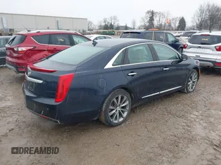 2013 Cadillac XTS Luxury with VIN 2G61P5S3XD9196239, listed as a IAAI auction lot 41205081 with 161,885 mi miles and . Bid and sale history available at carsss.com. Image 4.