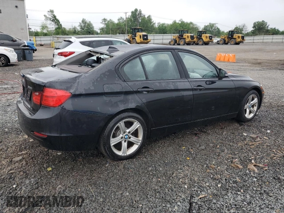 2013 BMW 3 Series 328i xDrive with VIN WBA3B5C53DF595177, listed as a Copart auction lot 57024375 with 124,873 mi miles and Salvage title. Bid and sale history available at DreamBid. Image 3.