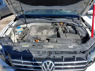 2014 Volkswagen Passat TDI SE w/Sunroof with VIN 1VWBN7A32EC016554, listed as a IAAI auction lot 41472156 with 178,149 mi miles. Bid and sale history available at carsss.com. Image 10.