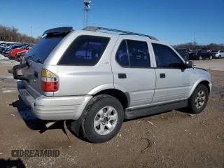 1999 Isuzu Rodeo S with VIN 4S2CK58WXX4373485, listed as a Copart auction lot 87804995 with 246,518 mi miles and Salvage title. Bid and sale history available at DreamBid. Image 3.