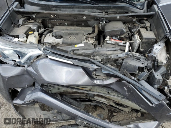 2018 Toyota RAV4 XLE with VIN 2T3RFREV2JW791353, listed as a Copart auction lot 51588515 with 126,830 mi miles and Salvage Title. Bid and sale history available at DreamBid. Image 13.