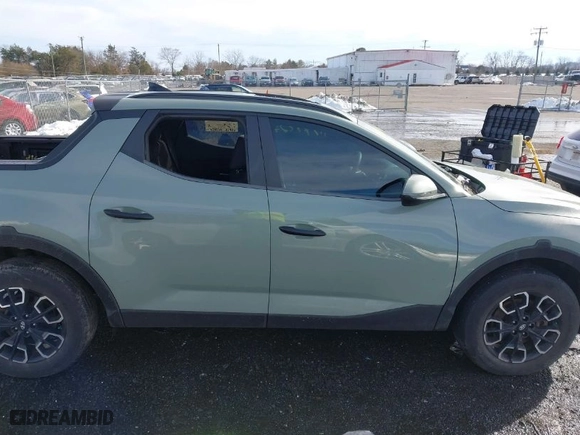 2022 Hyundai Santa Cruz SEL with VIN 5NTJC4AE1NH013087, listed as a IAAI auction lot 41574227 with NaN miles. Bid and sale history available at carsss.com. Image 13.