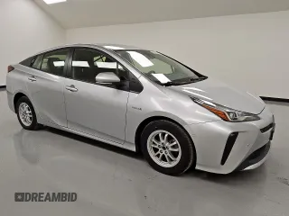 2021 Toyota Prius L Eco z VIN JTDKAMFU0M3140335, wystawiony jako Copart lot #61955845 z przebiegiem 96 071 mil mil oraz Czysty tytuł • Clean title. Historia ofert i sprzedaży dostępna na DreamBid. Obrazek 4.