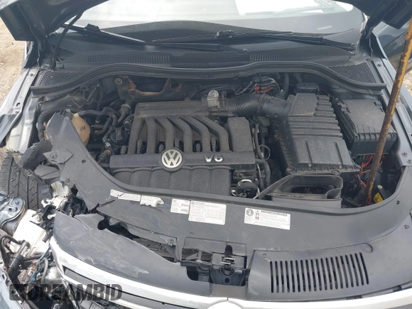 2013 Volkswagen CC Executive z VIN WVWGU7AN8DE520610, wystawiony jako IAAI lot #42278719 z przebiegiem 197 905 mil mil oraz . Historia ofert i sprzedaży dostępna na DreamBid. Obrazek 10.