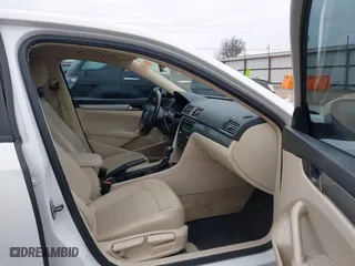 2014 Volkswagen Passat Wolfsburg Ed with VIN 1VWAS7A30EC119833, listed as a IAAI auction lot 41429589 with 181,630 mi miles. Bid and sale history available at carsss.com. Image 5.
