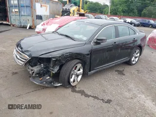 2010 Ford Taurus SHO with VIN 1FAHP2KT7AG132561, listed as a IAAI auction lot 31602484 with 118,333 mi miles and . Bid and sale history available at DreamBid. Image 2.
