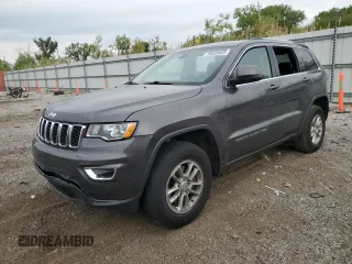 2018 Jeep Grand Cherokee Laredo E with VIN 1C4RJFAGXJC377549, listed as a Copart auction lot 58689905 with 75,531 mi miles and Salvage title. Bid and sale history available at DreamBid. Image 1.