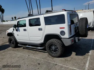 2005 Hummer H2 SUV with VIN 5GRGN23U35H132428, listed as a Copart auction lot 74594554 with 107,701 mi miles and Salvage Title. Bid and sale history available at carsss.com. Image 2.