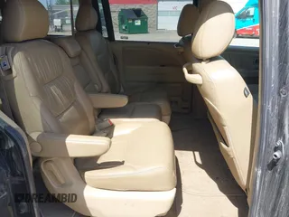 2009 Honda Odyssey Touring с VIN 5FNRL38999B018272, выставлен на аукционе IAAI как лот 42412203 с пробегом 154 987 миль миль и . История ставок и продаж доступна на DreamBid. Изображение 8.