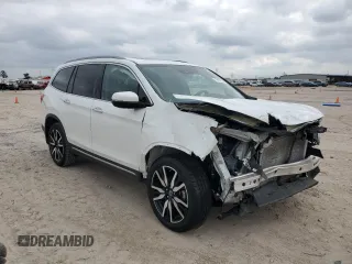 2021 Honda Pilot Touring 8-Passenger with VIN 5FNYF5H90MB001805, listed as a Copart auction lot 79101514 with 41,607 mi miles and Salvage Title. Bid and sale history available at DreamBid. Image 4.