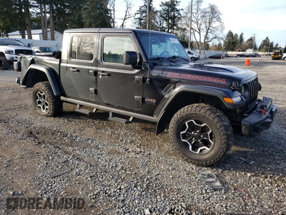 2021 Jeep Gladiator Rubicon with VIN 1C6JJTBG5ML500423, listed as a Copart auction lot 46954765 with 82,483 mi miles and Salvage title. Bid and sale history available at DreamBid. Image 4.