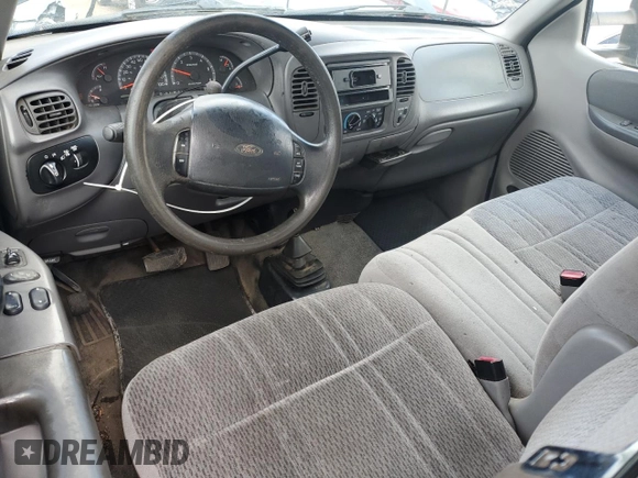 1999 Ford F-150 XL z VIN 1FTRX18L1XKB84628, wystawiony jako Copart lot #63050765 z przebiegiem Nie podano mil oraz Czysty tytuł • Clean title. Historia ofert i sprzedaży dostępna na DreamBid. Obrazek 8.