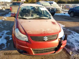 2009 Suzuki SX4 Man Touring Pkg AWD with VIN JS2YB417996202822, listed as a IAAI auction lot 41423724 with 181,531 mi miles. Bid and sale history available at carsss.com. Image 12.