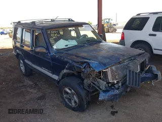 2001 Jeep Cherokee Sport with VIN 1J4FT48S01L581315, listed as a IAAI auction lot 40392021 with Not provided miles and . Bid and sale history available at DreamBid. Image 1.