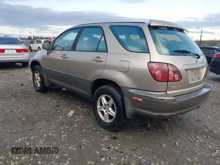 1999 Lexus RX 300 Luxury SUV with VIN JT6HF10U7X0090467, listed as a IAAI auction lot 41792768 with 263,408 mi miles. Bid and sale history available at carsss.com. Image 3.