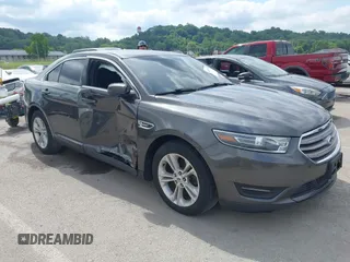 2015 Ford Taurus SEL z VIN 1FAHP2E83FG175051, wystawiony jako IAAI lot #42357517 z przebiegiem 200 033 mil mil oraz . Historia ofert i sprzedaży dostępna na DreamBid. Obrazek 1.