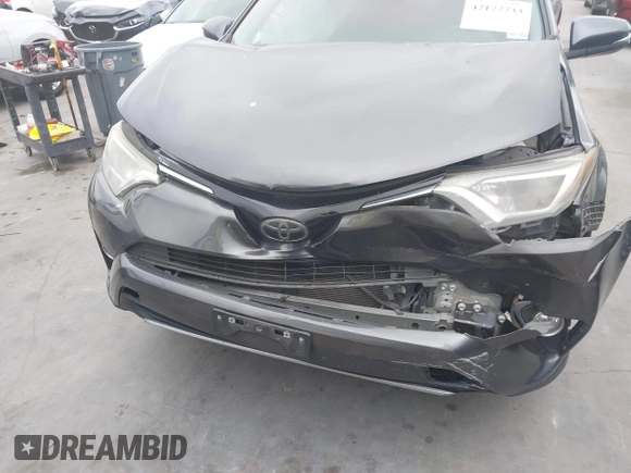 2018 Toyota RAV4 XLE with VIN 2T3WFREV1JW512476, listed as a IAAI auction lot 42177733 with 132,207 mi miles and . Bid and sale history available at DreamBid. Image 6.