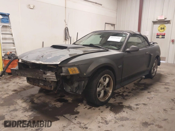 2002 Ford Mustang GT Deluxe z VIN 1FAFP45X92F176117, wystawiony jako IAAI lot #41619448 z przebiegiem 178 787 mil mil oraz . Historia ofert i sprzedaży dostępna na DreamBid. Obrazek 19.