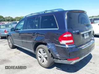 2012 Mercedes-Benz GL 350 with VIN 4JGBF2FEXCA776247, listed as a IAAI auction lot 41837519 with 119,421 mi miles and . Bid and sale history available at DreamBid. Image 6.