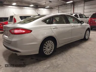 2015 Ford Fusion SE Hybrid with VIN 3FA6P0LU7FR266702, listed as a IAAI auction lot 41390791 with 94,465 mi miles. Bid and sale history available at carsss.com. Image 4.