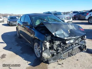 2011 Kia Optima LX with VIN KNAGM4A7XB5133681, listed as a IAAI auction lot 41602973 with 210,615 mi miles. Bid and sale history available at carsss.com. Image 1.
