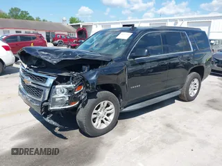 2019 Chevrolet Tahoe LT z VIN 1GNSKBKC1KR200476, wystawiony jako IAAI lot #41897702 z przebiegiem 136 432 mil mil oraz . Historia ofert i sprzedaży dostępna na DreamBid. Obrazek 2.
