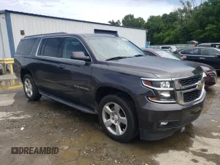 2016 Chevrolet Suburban LT with VIN 1GNSCHKC3GR312221, listed as a Copart auction lot 57445934 with 157,958 mi miles and Salvage Title. Bid and sale history available at carsss.com. Image 4.