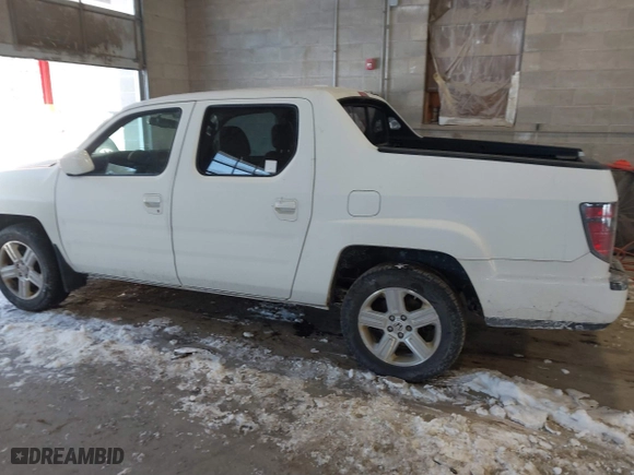 2014 Honda Ridgeline RTL with VIN 5FPYK1F55EB012490, listed as a IAAI auction lot 41391884 with 130,121 mi miles. Bid and sale history available at carsss.com. Image 14.