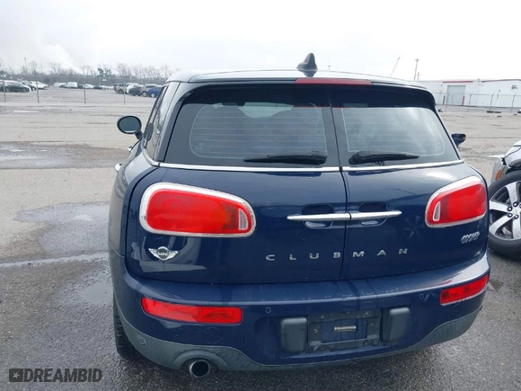 2016 MINI Cooper Clubman with VIN WMWLN5C54G2E30843, listed as a IAAI auction lot 41371368 with 1 mi miles. Bid and sale history available at carsss.com. Image 16.