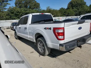 2021 Ford F-150 XL with VIN 1FTFW1E82MKD23506, listed as a Copart auction lot 71162334 with 71,387 mi miles and Salvage Title. Bid and sale history available at carsss.com. Image 2.