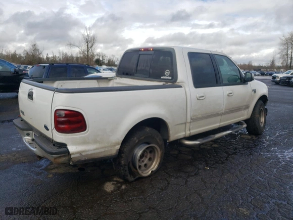 2002 Ford F-150 XLT with VIN 1FTRW07L12KA32310, listed as a Copart auction lot 44012485 with 200,586 mi miles and Salvage Title. Bid and sale history available at carsss.com. Image 3.