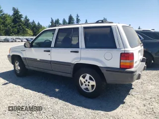 1994 Jeep Grand Cherokee Laredo with VIN 1J4GZ58Y7RC113333, listed as a Copart auction lot 57995734 with 220,950 mi miles and Clean Title. Bid and sale history available at carsss.com. Image 2.