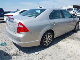 2010 Ford Fusion SEL with VIN 3FAHP0JG6AR282999, listed as a IAAI auction lot 42031162 with 128,001 mi miles and . Bid and sale history available at DreamBid. Image 4.
