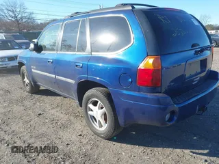 2006 GMC Envoy SLT with VIN 1GKDT13S762170322, listed as a IAAI auction lot 41324540 with 999,999 mi miles. Bid and sale history available at carsss.com. Image 3.